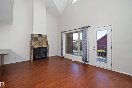 #5 100 Heron Point Cl, Rural Wetaskiwin County, AB - Indoor With Fireplace