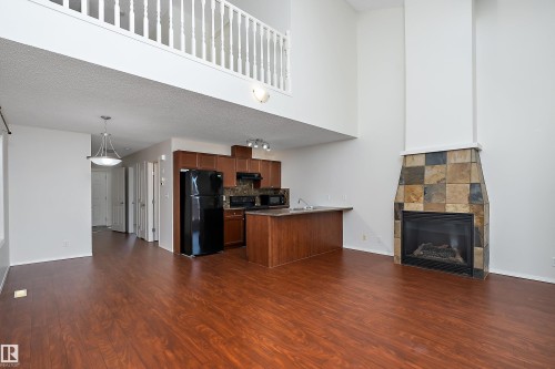 #5 100 Heron Point Cl, Rural Wetaskiwin County, AB - Indoor With Fireplace
