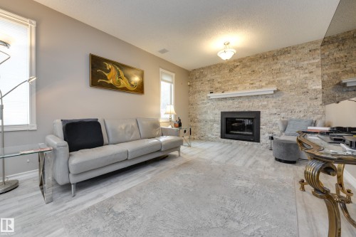 4335 47 Street, Edmonton, AB - Indoor Photo Showing Living Room With Fireplace