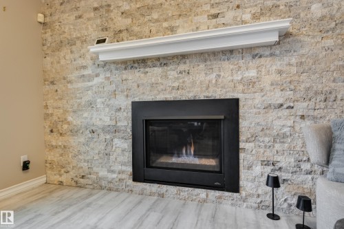 4335 47 Street, Edmonton, AB - Indoor Photo Showing Living Room With Fireplace