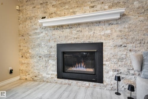 4335 47 Street, Edmonton, AB - Indoor Photo Showing Living Room With Fireplace