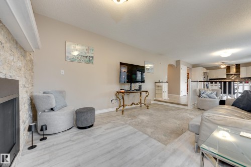 4335 47 Street, Edmonton, AB - Indoor Photo Showing Living Room With Fireplace