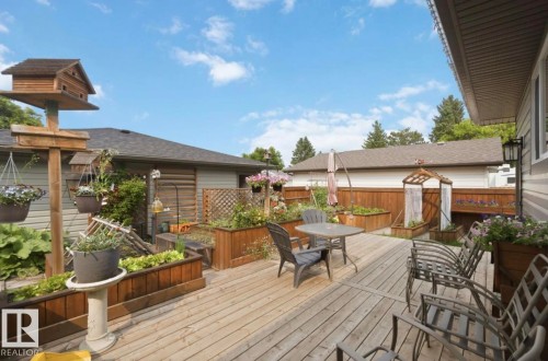 Spacious outdoor deck with a natural wood finish - 4007 45 Street, Stony Plain, AB 