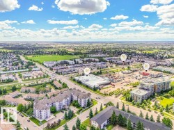 Aerial perspective showcasing a developed urban area with commercial and residential properties - 