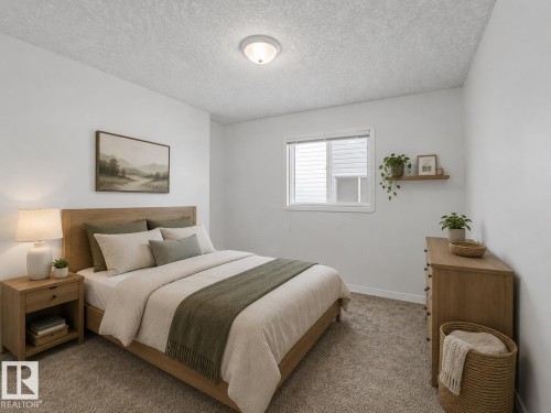 Bedroom featuring light-tone carpet flooring, a single window with blinds, and a flush-mount ceiling light - 1619 Welbourn Cove, Edmonton, AB 