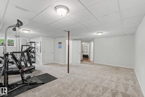 Spacious room with light gray carpet and white walls - 1619 Welbourn Cove, Edmonton, AB 