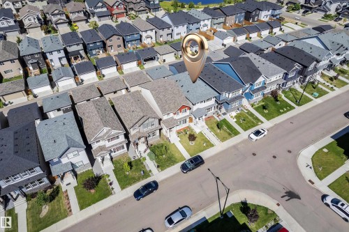 Residential neighborhood with a variety of architectural styles, including two-story and single-story properties - 2246 54 Street, Edmonton, AB 