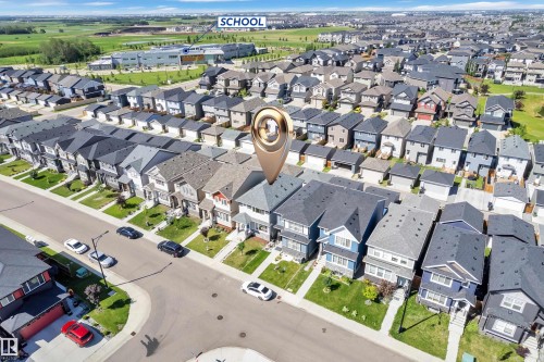 Residential neighborhood featuring detached homes with varied exterior finishes - 2246 54 Street, Edmonton, AB 