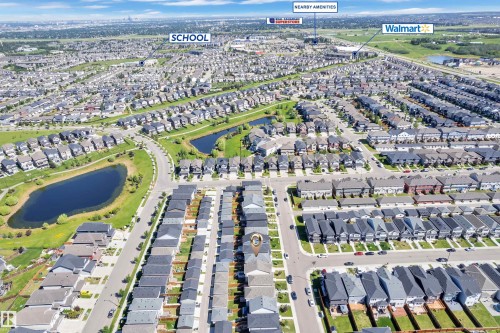 Aerial perspective showcasing a residential community with diverse housing styles - 2246 54 Street, Edmonton, AB 