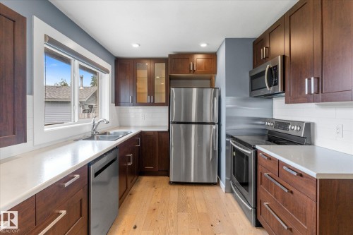 10945 164 Street Nw, Edmonton, AB - Indoor Photo Showing Kitchen With Double Sink