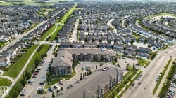 Aerial perspective showcasing a residential development with varied housing styles - 