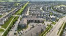 Aerial perspective showcasing a residential development with varied housing styles - 415 111 Watt Common, Edmonton, AB 