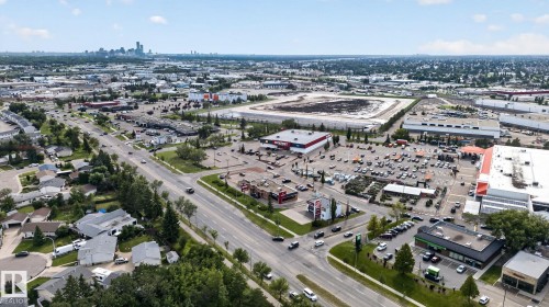 Expansive commercial district featuring multiple retail establishments and a prominent roadway - 4712 131 Avenue Nw, Edmonton, AB 