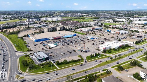 Aerial perspective showcasing a commercial development with multiple retail buildings - 4712 131 Avenue Nw, Edmonton, AB 