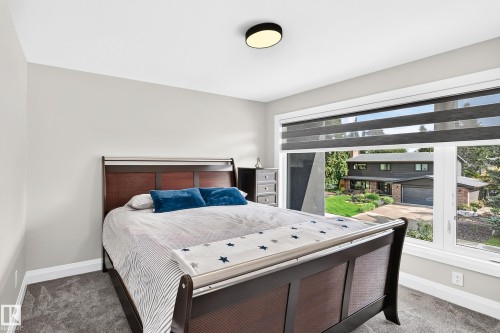Bright room with carpet flooring and light gray walls - 12631 52 Avenue, Edmonton, AB 