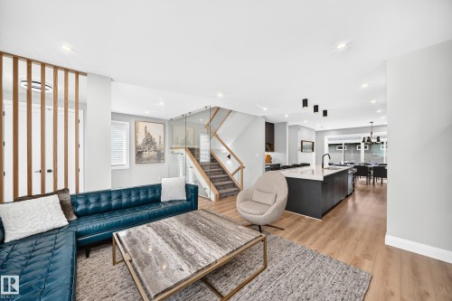 Open concept living space featuring wood-finish flooring - 12631 52 Avenue, Edmonton, AB 