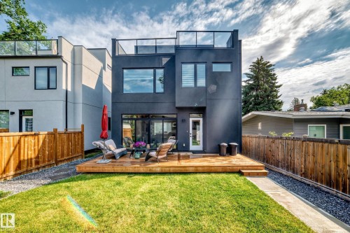 Modern exterior featuring a dark facade with multiple windows - 12631 52 Avenue, Edmonton, AB 