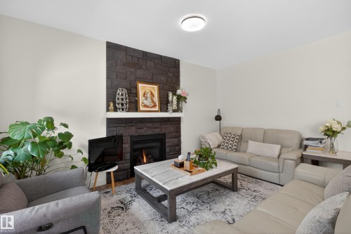 52 Aberdeen Crescent, Sherwood Park, AB - Indoor Photo Showing Living Room With Fireplace