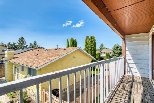 Private balcony featuring wood flooring and a white metal railing - 11507 141 Avenue Nw, Edmonton, AB - Outdoor With Balcony With Exterior