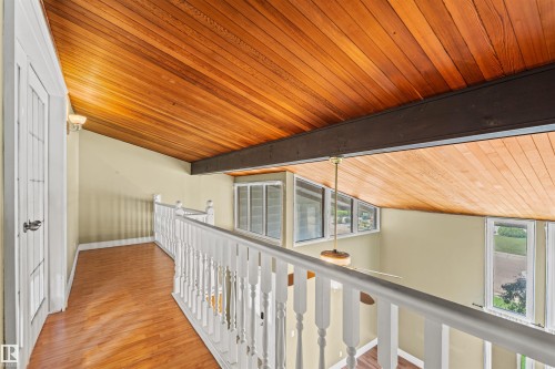 Vaulted wood-finish ceiling featuring exposed structural beams and recessed lighting - 11507 141 Avenue Nw, Edmonton, AB - Indoor Photo Showing Other Room