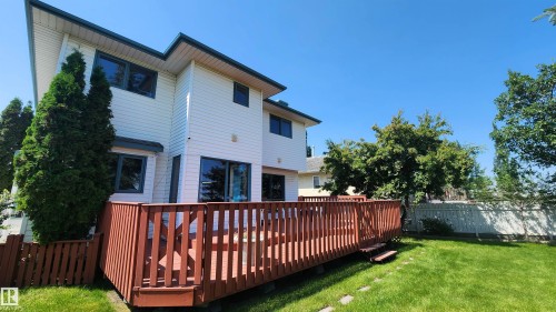 Expansive wood-finish deck with multiple levels and integrated steps - 2708 44A Avenue, Edmonton, AB 