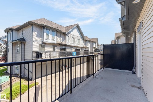 Private balcony featuring concrete flooring and black metal railings - 24 655 Watt Boulevard, Edmonton, AB 