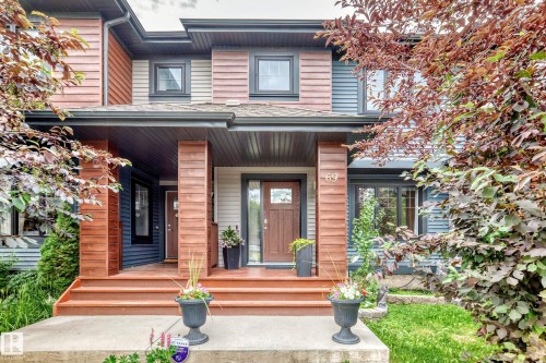 Multi-level facade featuring horizontal siding and wood-finish paneling - 69 Tonewood Boulevard, Spruce Grove, AB - Outdoor