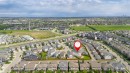 Aerial perspective of a developed residential community with established homes and paved roadways - 1235 164 Street, Edmonton, AB 