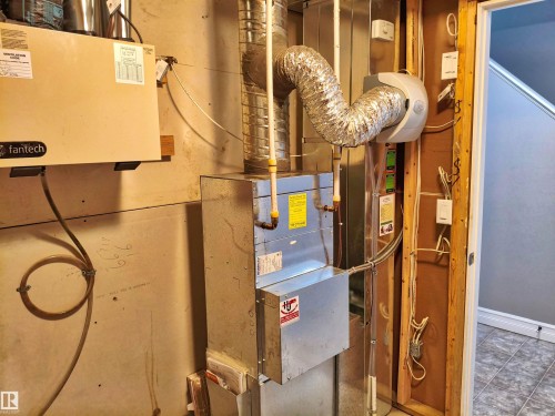 HVAC system featuring a furnace, ductwork, and ventilation unit - 23 1508 105 Street, Edmonton, AB 