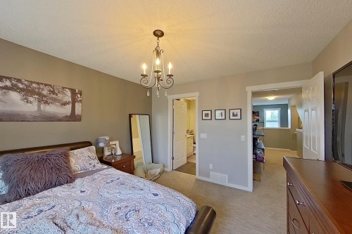 Bedroom featuring neutral wall colors and carpeted flooring - 14412 98 Street, Edmonton, AB - Indoor Photo Showing Bedroom