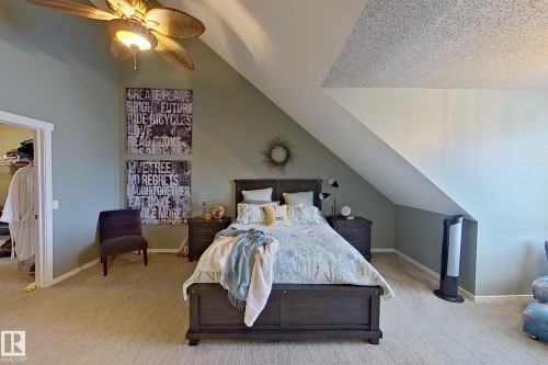 Angled ceiling lines with a textured finish - 14412 98 Street, Edmonton, AB - Indoor Photo Showing Bedroom