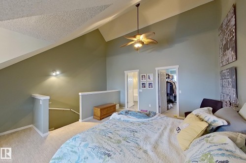 Vaulted ceilings featuring a ceiling fan with integrated lighting - 14412 98 Street, Edmonton, AB - Indoor Photo Showing Bedroom