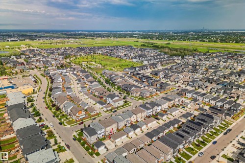Aerial perspective showcasing a residential community with varied architectural styles - 383 Charlesworth Drive, Edmonton, AB 