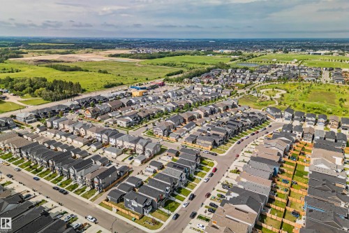 Aerial perspective showcasing a residential community with varied architectural styles - 383 Charlesworth Drive, Edmonton, AB 