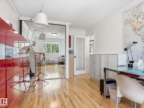 Hardwood-style flooring throughout - 301 10003 87 Avenue, Edmonton, AB - Indoor