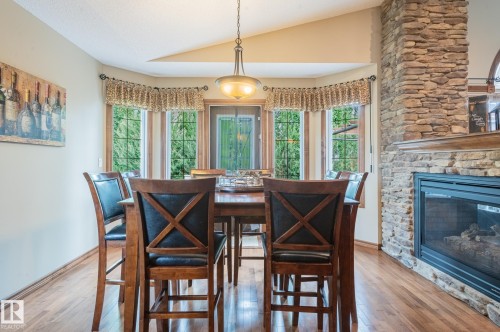 Dining area - 19 Newton Place, St. Albert, AB - Indoor Photo Showing Dining Room With Fireplace
