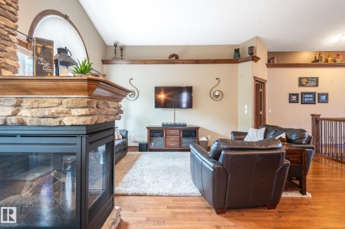 Living room - 19 Newton Place, St. Albert, AB - Indoor Photo Showing Living Room With Fireplace