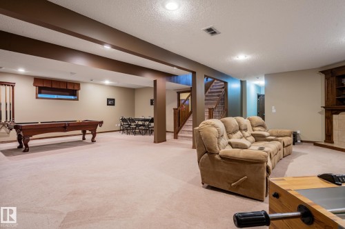 Spacious finished lower level featuring recessed lighting, exposed ceiling beams, and light-toned carpeting - 19 Newton Place, St. Albert, AB - Indoor Photo Showing Other Room