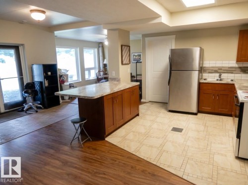 #9 Pinebrook Estates, Rural Thorhild County, AB - Indoor Photo Showing Kitchen With Double Sink
