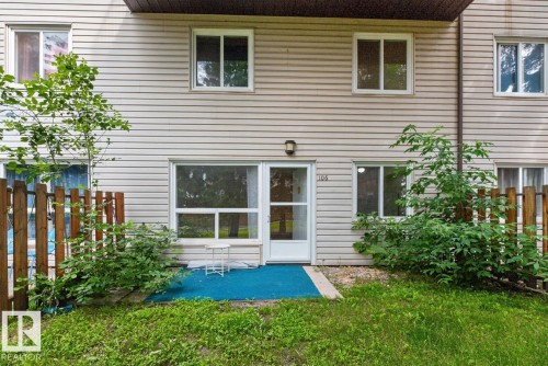 Vinyl siding exterior with multiple windows - 106 237 Woodvale Road W, Edmonton, AB 