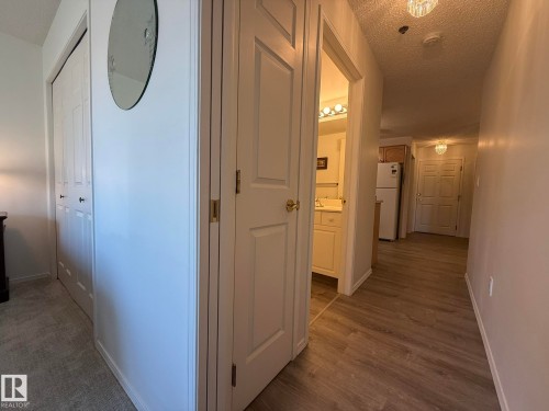 PHOTO OF THE HALLWAY BETWEEN THE 2nd BEDROOM & THE FULL 4pc BATHROOM! - 102 10903 21 Avenue, Edmonton, AB - Indoor Photo Showing Other Room