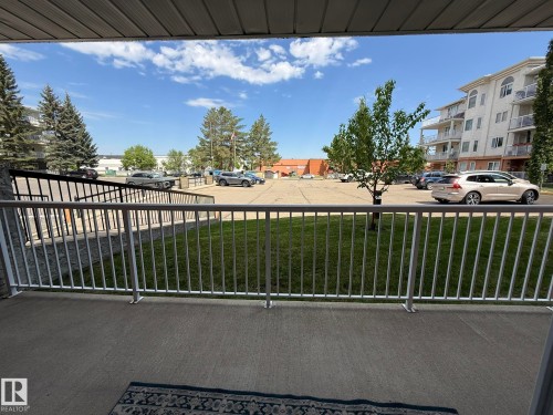 HERE IS YOUR VIEW FROM THE LIVING ROOM ONTO YOUR NORTH FACING PATIO! SO YOU CAN WATCH THE WORLD GO BY.... - 102 10903 21 Avenue, Edmonton, AB - Outdoor