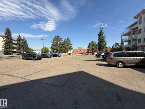 PHOTO OF THE LARGE GUEST PARKING AREA FOR THIS 10903-21 AVE. NW BUILDING! - 102 10903 21 Avenue, Edmonton, AB - Outdoor