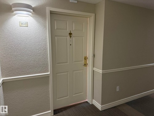 ANOTHER PHOTO OF THE ENTRY DOOR TO YOUR UNIT #102! - 102 10903 21 Avenue, Edmonton, AB - Indoor Photo Showing Other Room