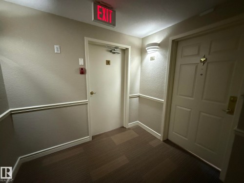 PHOTO OF YOUR #102 ENTRY DOOR! AGAIN LOCATED AT THE END OF THE HALL WHERE IT'S NICE & QUIET! - 102 10903 21 Avenue, Edmonton, AB - Indoor Photo Showing Other Room