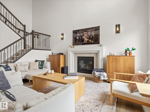 3648 6 Street Nw, Edmonton, AB - Indoor Photo Showing Living Room With Fireplace