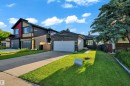 Traditional exterior with stone accents and an attached garage - 1316 35 Street, Edmonton, AB 