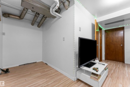 Open interior space featuring light wood-finish flooring - 1316 35 Street, Edmonton, AB 