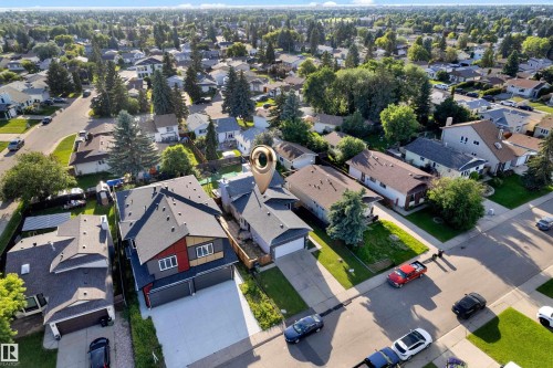 Suburban neighborhood with mature trees and a grid street layout - 1316 35 Street, Edmonton, AB 