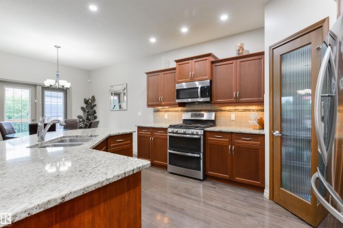16 Ashton Gate, Spruce Grove, AB - Indoor Photo Showing Kitchen With Double Sink